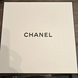 Official Chanel box. White top Black box Black Chanel name on box